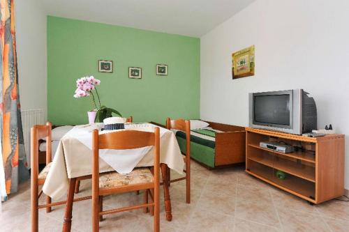 Family friendly apartments with a swimming pool Novalja, Pag - 14394