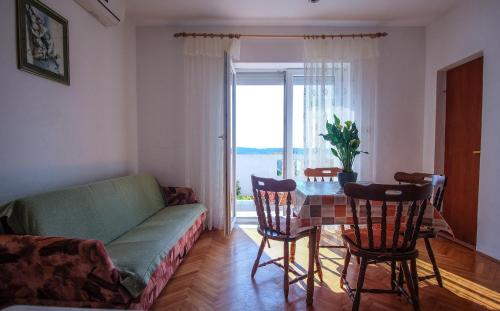 Apartments with a parking space Barbat, Rab - 14431