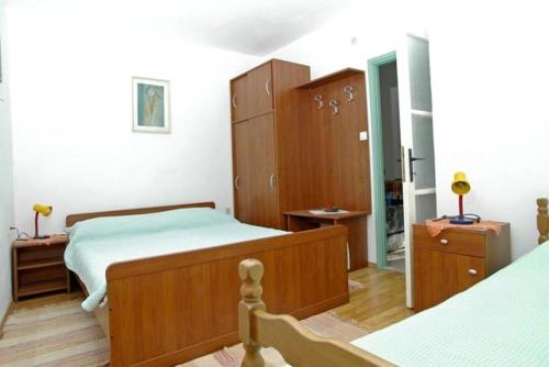 Posteľ alebo postele v izbe v ubytovaní Apartments by the sea Cove Mikulina Luka, Korcula - 16397