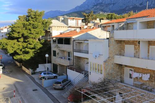Fotografia z galérie ubytovania Apartments and rooms with parking space Makarska - 16449 v destinácii Makarska
