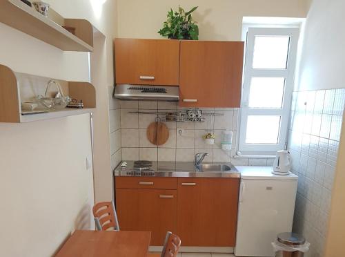 Kuchyň nebo kuchyňský kout v ubytování Apartments with parking spaces Makarska - 16521
