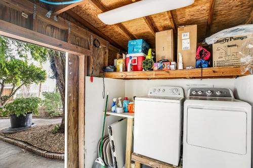a kitchen with two washers and a stove in a trailer at Sunset Bay in Key West