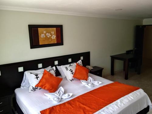 Ein Bett oder Betten in einem Zimmer der Unterkunft Hotel El Sueño De J.E.