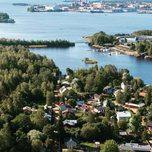 an aerial view of a town and a lake at Guesthouse Lokinlaulu in Kotka