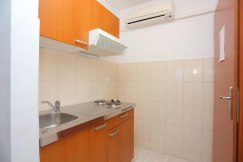 Apartments and rooms by the sea Trogir - 16536