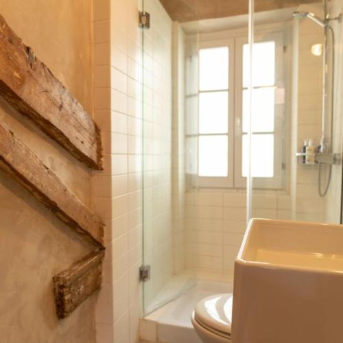 a bathroom with a toilet and a shower and a sink at Nasos Corfu Town Apartment in Corfu