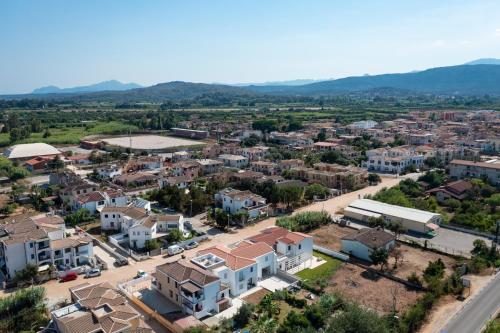 an aerial view of a small town with houses at Sa Omu Bianca in Tortolì