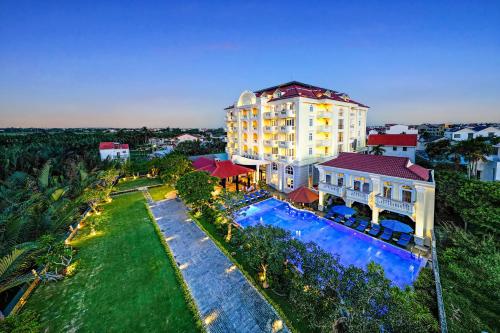 an aerial view of a hotel with a swimming pool at Le Pavillon Hoi An Luxury Resort & Spa in Hoi An
