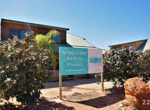 a sign in front of a building at The Ningaloo breeze villa 4 in Exmouth