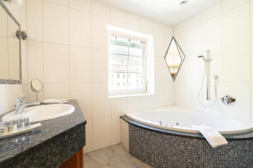 Koupelna v ubytování Riedz Apartments Innsbruck- Zentrales Apartmenthaus mit grüner Oase
