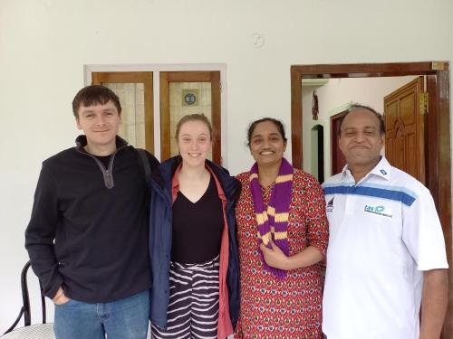 a group of people posing for a picture at Wild Window - Forest View Homestay in Thekkady