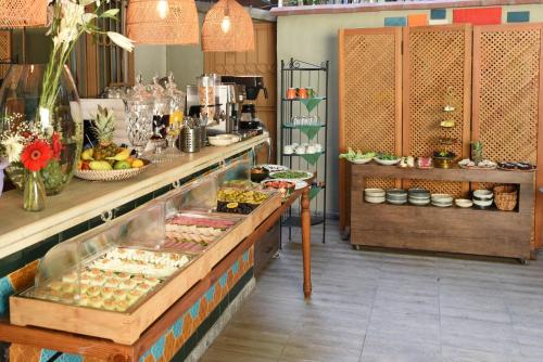 a kitchen with a counter with food on it at The Marions Suite istanbul Special Category Taksim in Istanbul