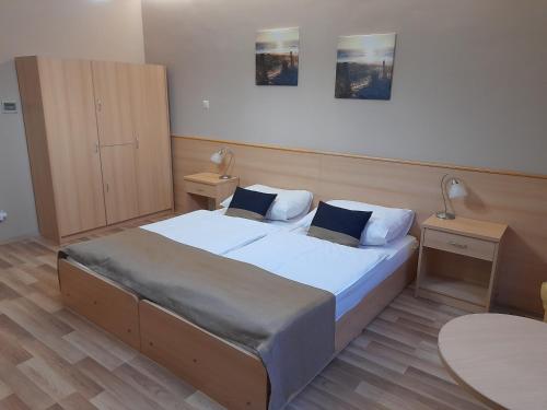 Ένα ή περισσότερα κρεβάτια σε δωμάτιο στο A Bárány