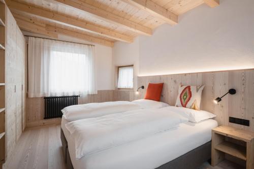 Postel nebo postele na pokoji v ubytování CHALET MARLENE - Ferienhaus