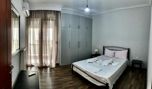 Postel nebo postele na pokoji v ubytování A&D City Apartment