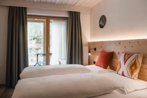 Postel nebo postele na pokoji v ubytování CHALET MARLENE - Ferienhaus