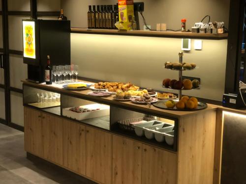 a buffet in a restaurant with food on a counter at HOTEL MONTE PERDIDO in Bielsa