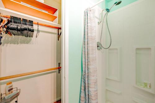 a bathroom with a shower and a shower curtain at Pine Tree Place - Unit 3 in South Lake Tahoe