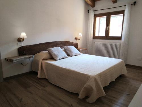 Кровать или кровати в номере Agriturismo Le Macere