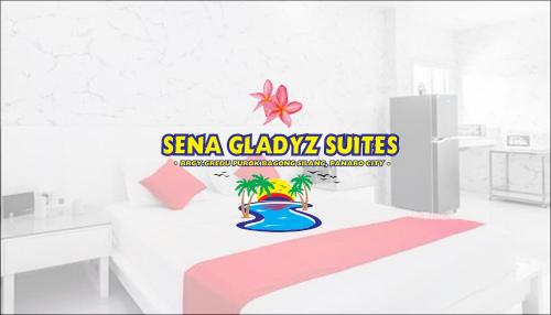 a room with a table with a flower in a vase at Sena Gladyz Suites in Panabo