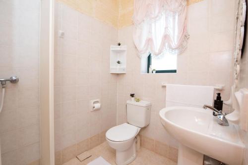 Koupelna v ubytování Ta Indri Holiday Home