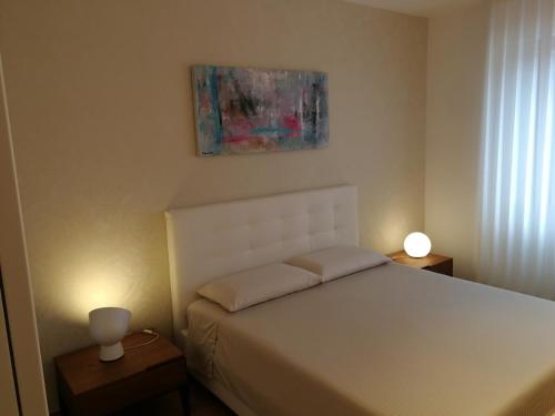 Posteľ alebo postele v izbe v ubytovaní Comfort, pulizia, eleganza e affidabilità a Matera