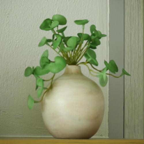 a white vase with a plant in it on a shelf at Chelona Beachfront Huahin in Khao Tao
