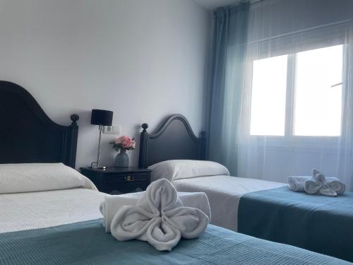 Ένα ή περισσότερα κρεβάτια σε δωμάτιο στο ARZUAWAY