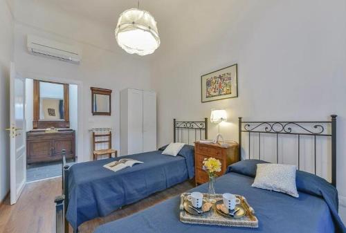 Posteľ alebo postele v izbe v ubytovaní San Giuseppe Flat