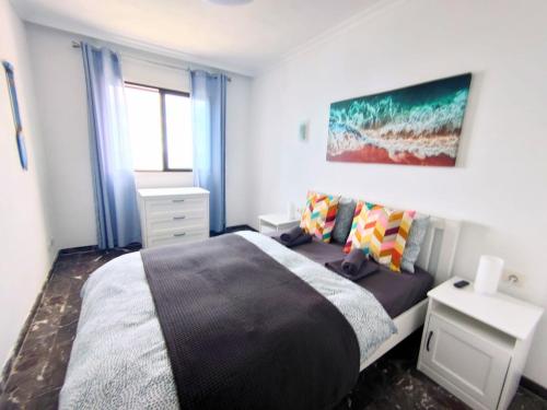 A bed or beds in a room at Buenavista The Blue Oyster