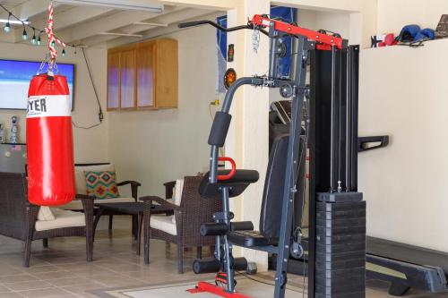 a gym with a punching bag and a punching bag at Seaside Adventure Lodging in Ensenada