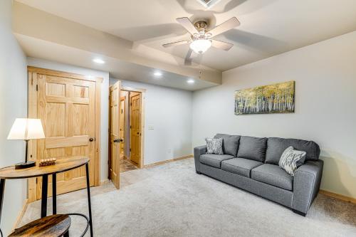 a living room with a couch and a table at Deer Run Retreat in Ellijay