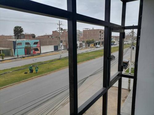 a view of a street from a window at Departamento Smart- Chiclayo B2 in Chiclayo