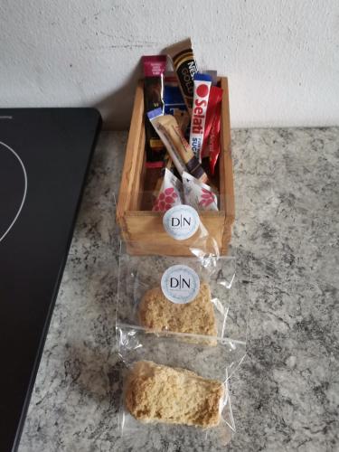 a box of bread and snacks on a counter at Dreamers nest in Richards Bay
