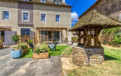 a house with a gazebo in front of it at 3 Bedroom Stunning Home In Baraqueville in Baraqueville