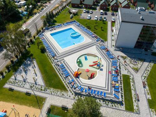 an overhead view of a swimming pool in a park at Zem-Tourist in Pustkowo