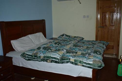 Krevet ili kreveti u jedinici u okviru objekta Rose Mount Hotel