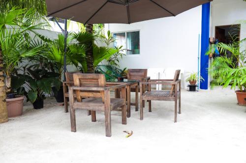 Ein Patio oder anderer Außenbereich in der Unterkunft Palm Residence