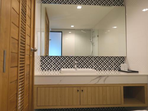 Koupelna v ubytování Sann Boutique Hotel