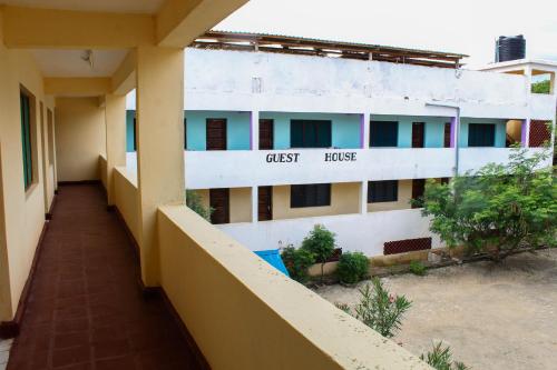 a building with the name of a guest house at Armaan Guest House in Diani Beach