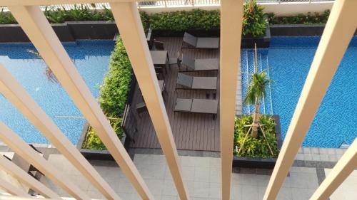 an overhead view of a pool in a building at SMDC Coast Residences near PICC World Trade Center MOA in Manila