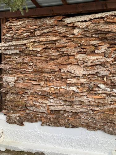 a stone building with a stone wall at Stonehouse dome Lagadia in Lagadia