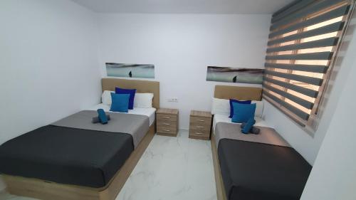 Posteľ alebo postele v izbe v ubytovaní Ibi Apartamentos Los Monegros