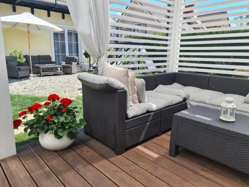 Гостиная зона в APARTAMENTY "LA VILLA" z klimatyzacją, ogrodem, parkingiem, blisko centrum