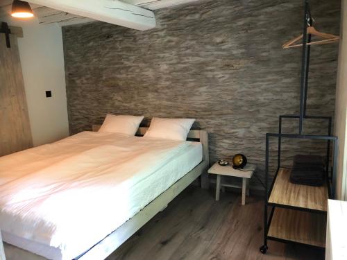 Postel nebo postele na pokoji v ubytování B&B Le Nid d'Hirondelle