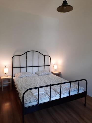Кровать или кровати в номере Apartmány Janská