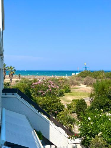 Appartement entre la lagune et la mer avec piscine, direct plage, vue partielle mer