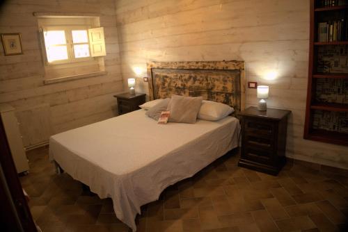 Cama ou camas em um quarto em Agriturismo Santo Regolo - relax toscano ✺✺✺