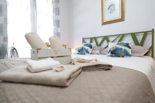 Postel nebo postele na pokoji v ubytování [NEW LOANO] Elegante ☆☆☆☆☆ a 150 mt dal mare