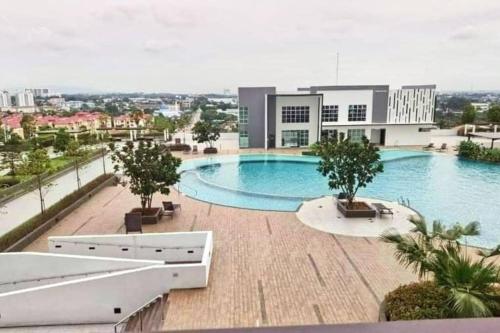 a large swimming pool on top of a building at 1601 SKS MidValley Terminal bus NetflixWifi By STAY in Johor Bahru